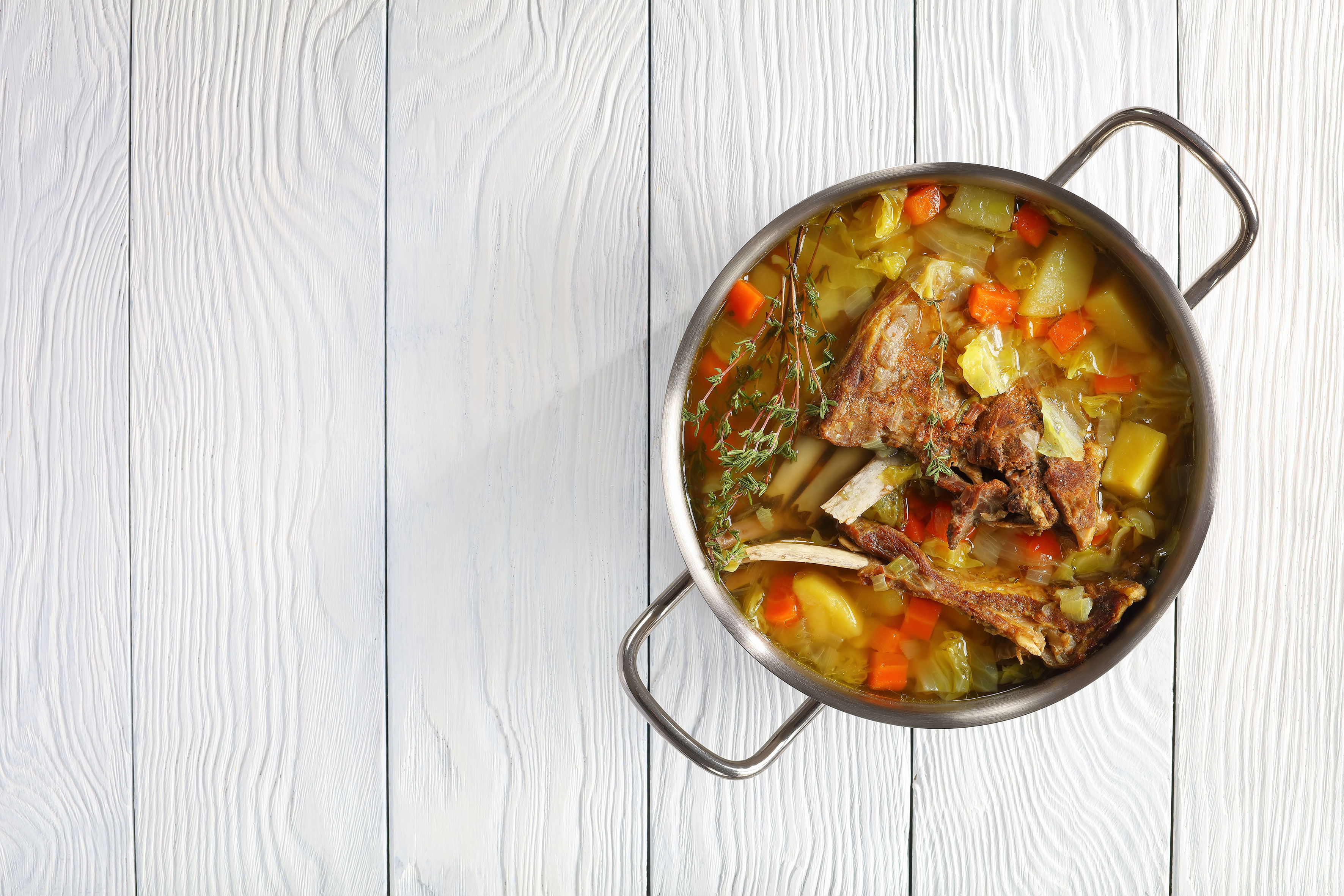 Icelandic-Lamb-Soup-kjotsupa-in-a-stainless-steel-casserole-pan-on-wooden-table-classic-recipe-view-from-above_small